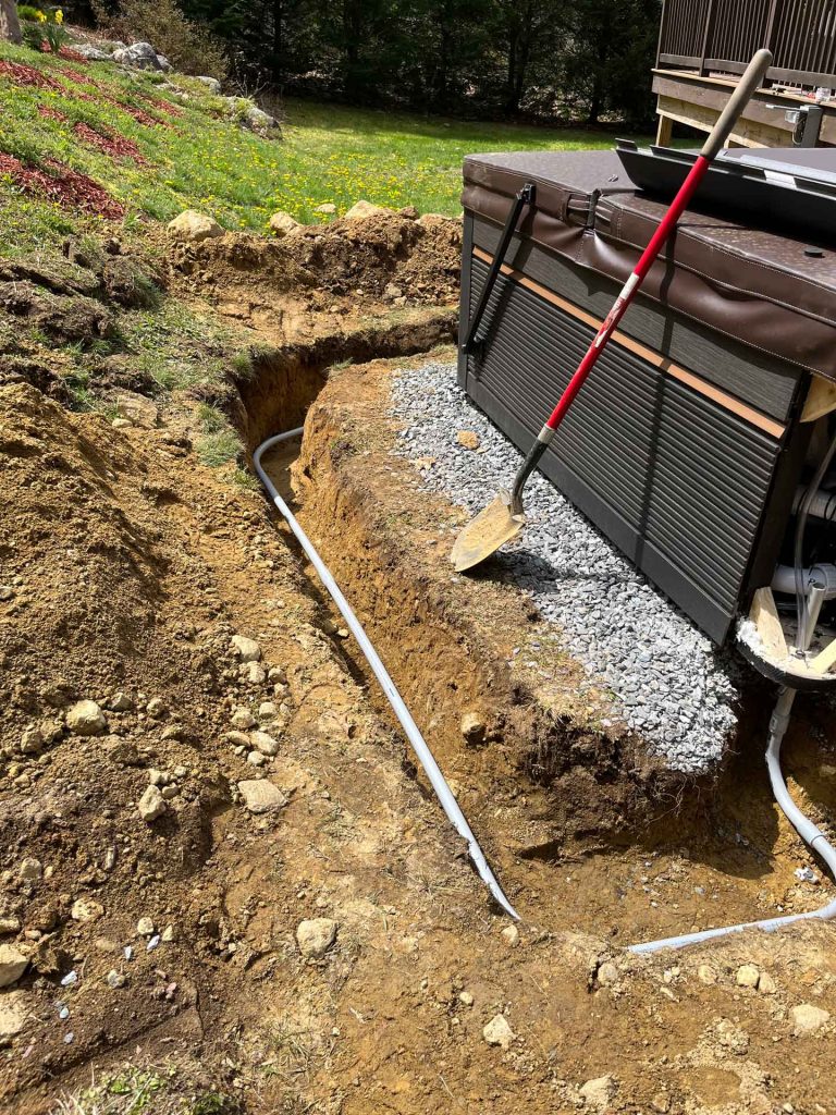 Trench dug for hot tub wiring