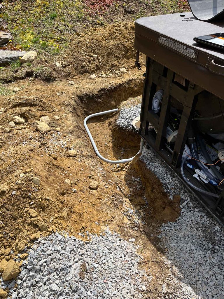 Trench dug for hot tub wiring