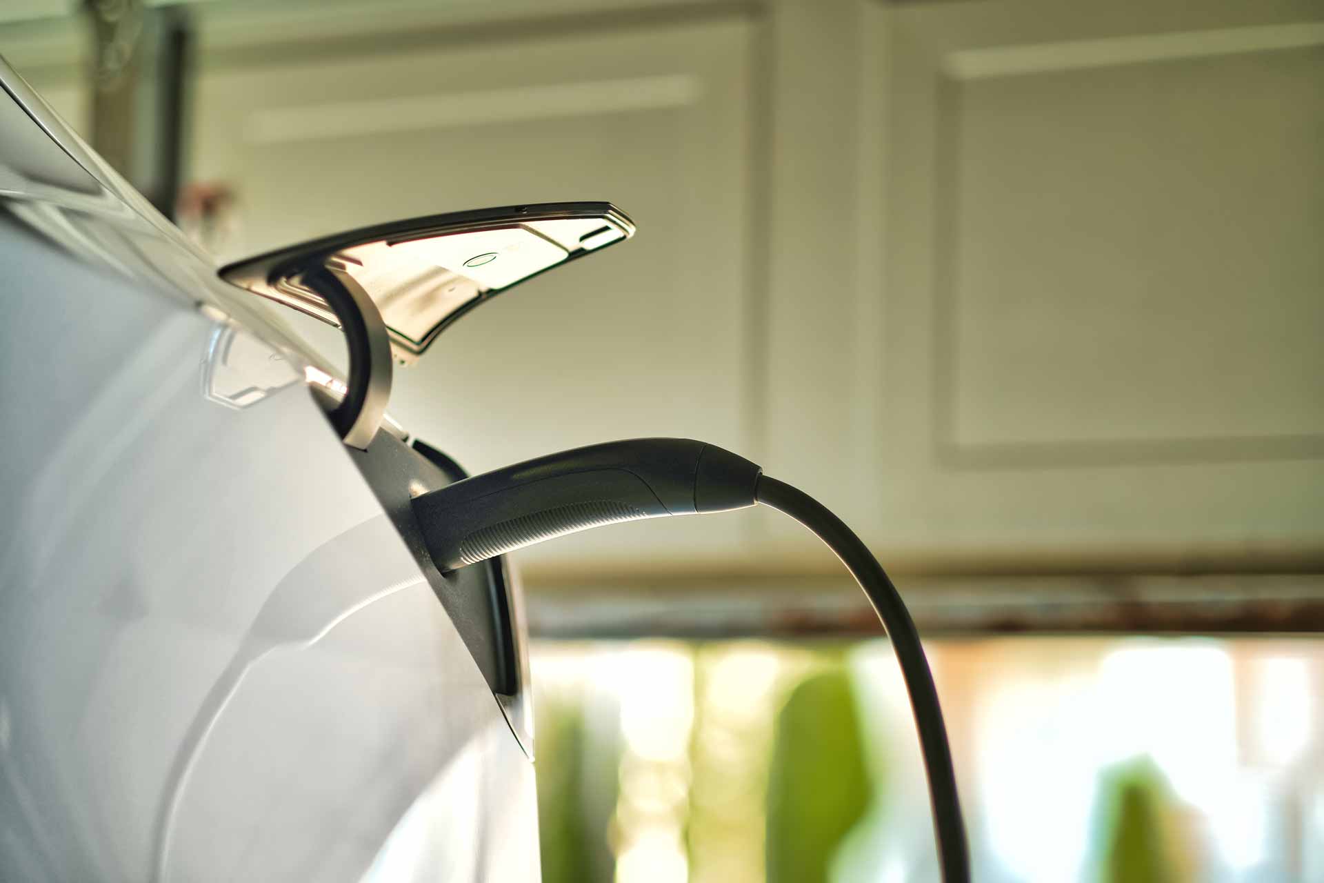 EV charger plugged in to car