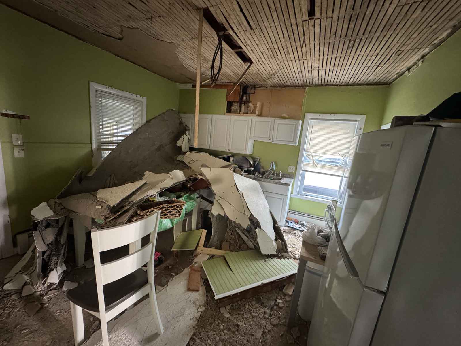 Kitchen with collapsed ceiling